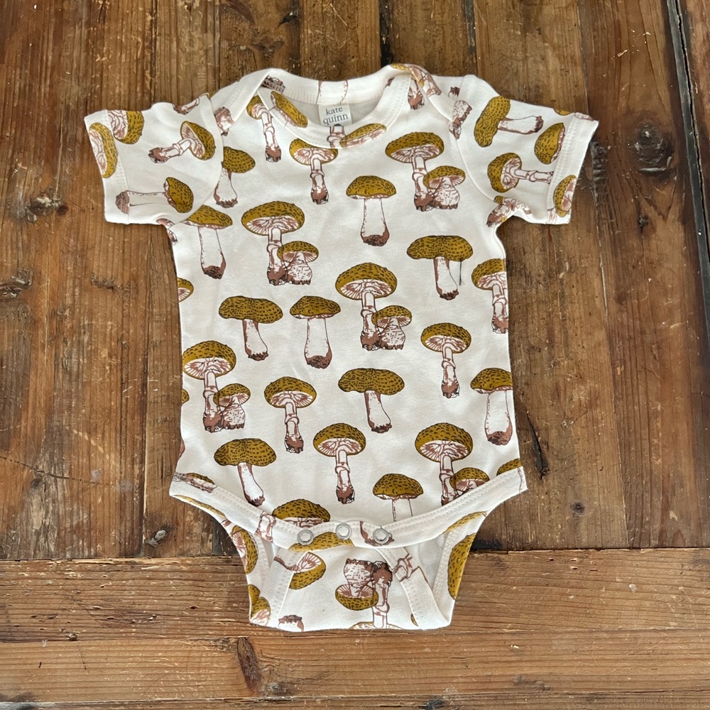 Kate Quinn mushroom onesie